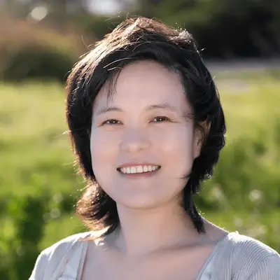 Portrait of Susan Yuan, Director of the Reading Club at BrightUp Kids